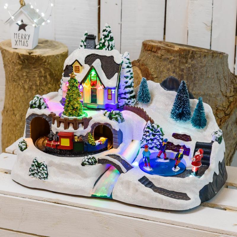 Holiday Villages | Battery operated Christmas Village, Tree, Moving Train and Ice Skaters, h 25cm, Christmas Music Figure Lights Holiday Villages