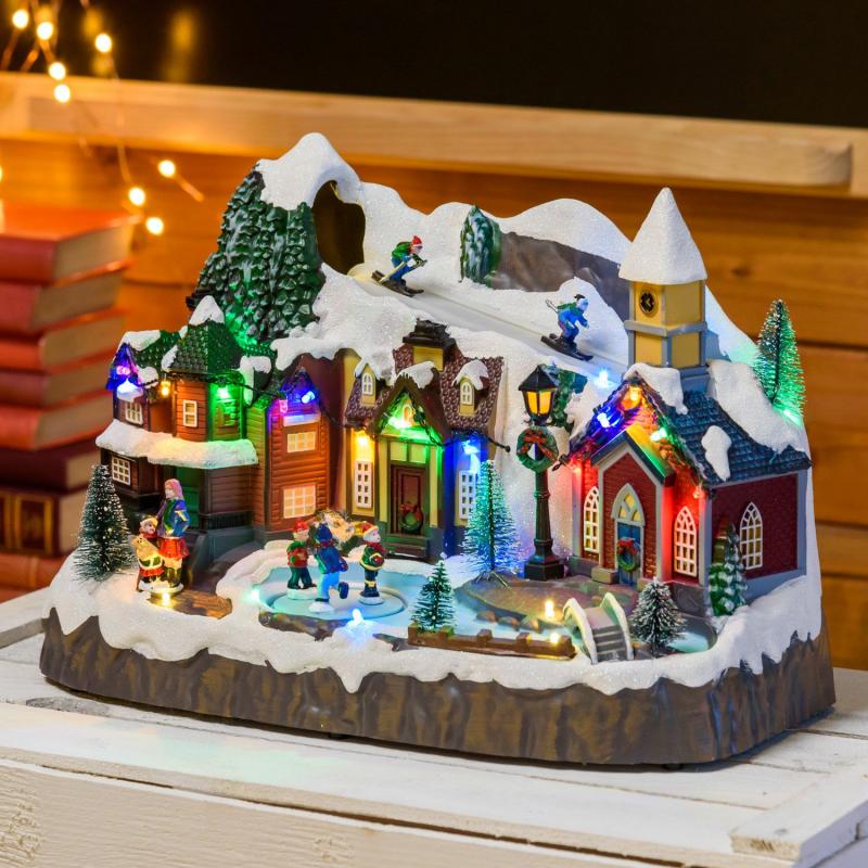 Holiday Villages | Christmas Village, Skiers on Track and Rotating Ice Skaters, h 24 cm, with Christmas Music Figure Lights Holiday Villages